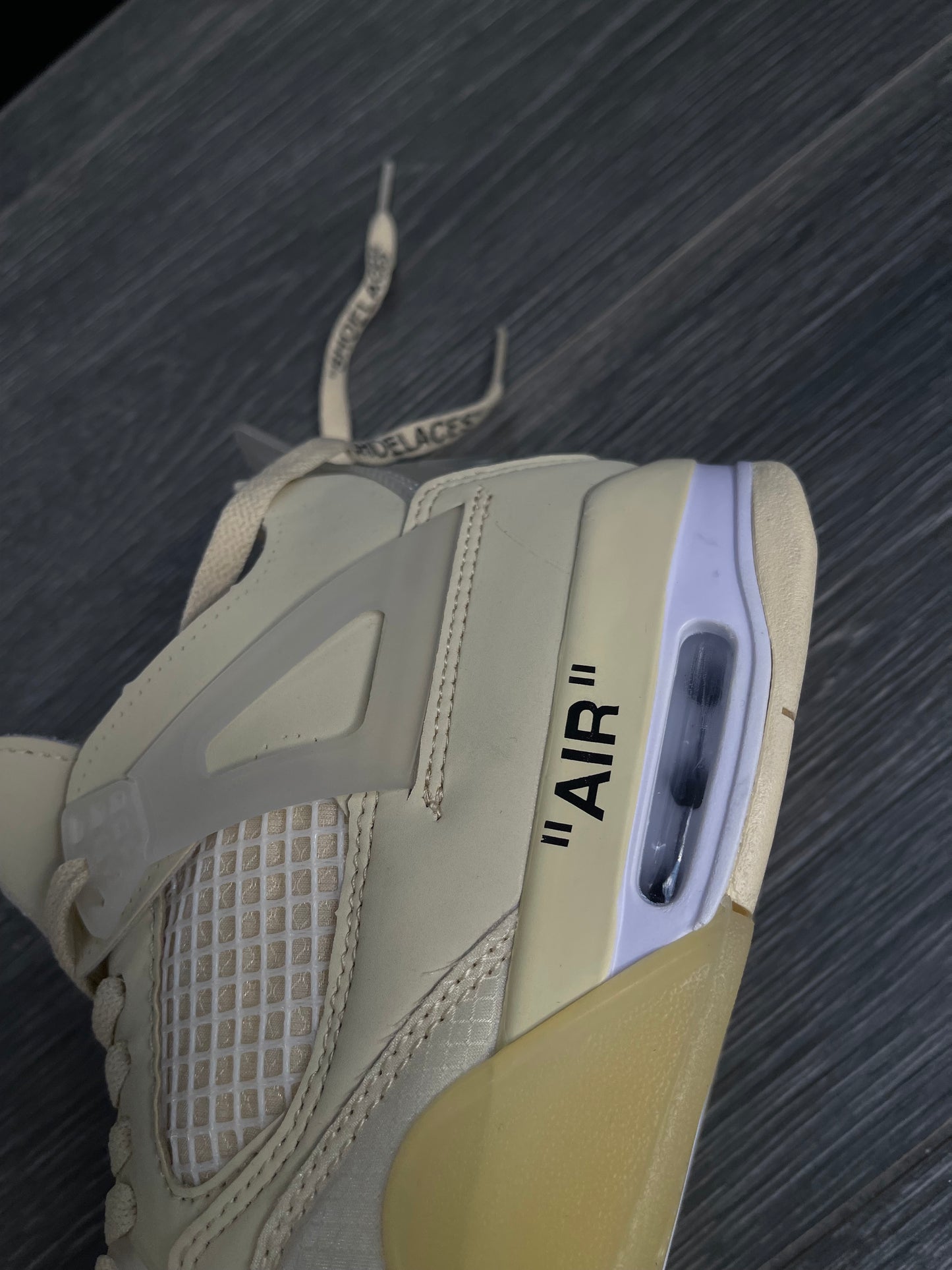 Off-White x Air Jordan 4 Retro “Sail”